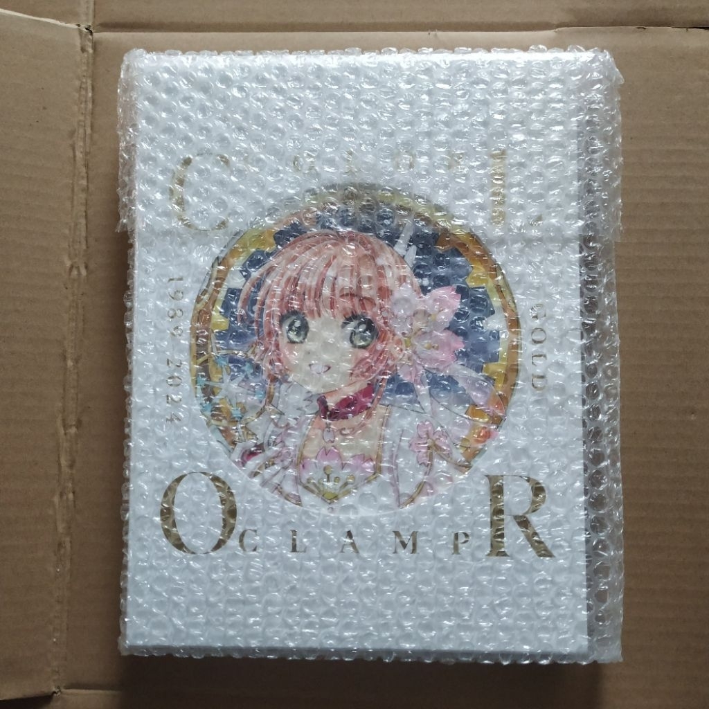 Clamp Exhibition Artbook Color Gold