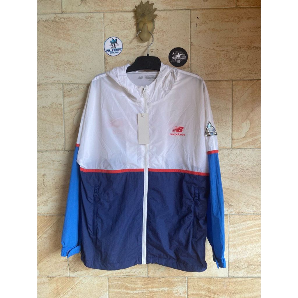 New Balance JACKET running Remaja