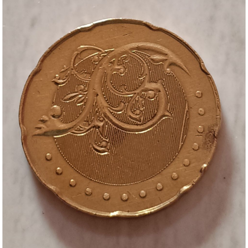 koin Malaysia 50 cent (kuning) tahun 2012..