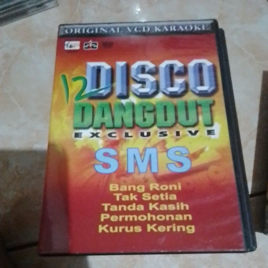 VCD karaoke 12 disco dangdut exclusive sms