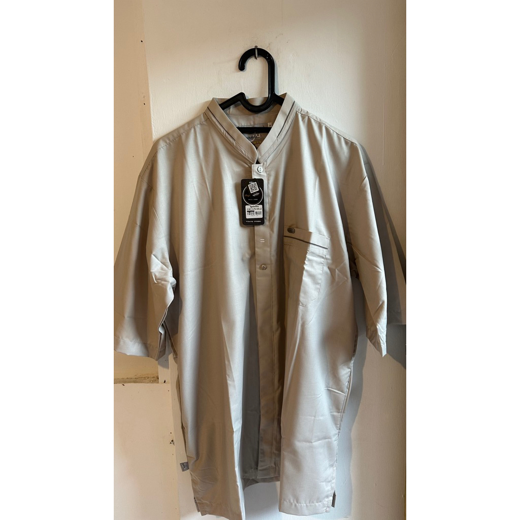 baju koko syahdika
