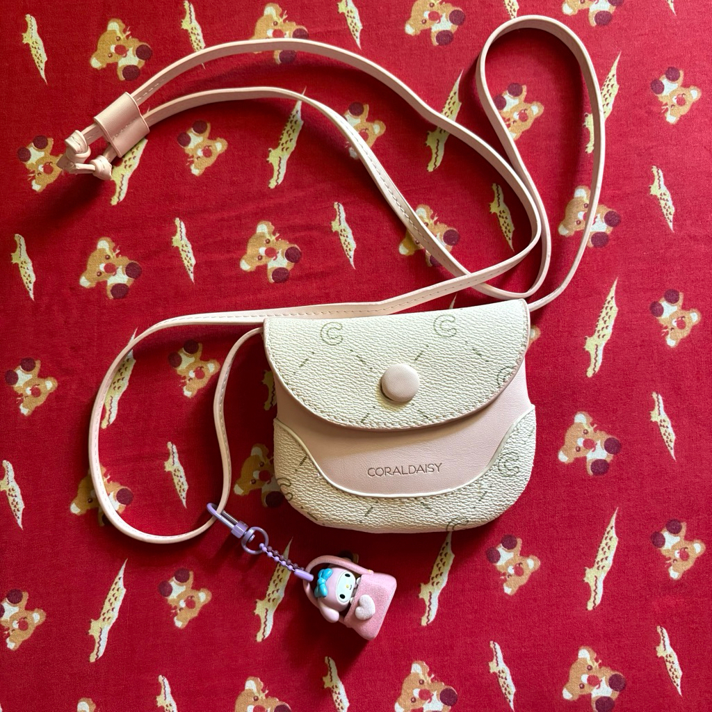 peloved slingbag mini coral daisy like new