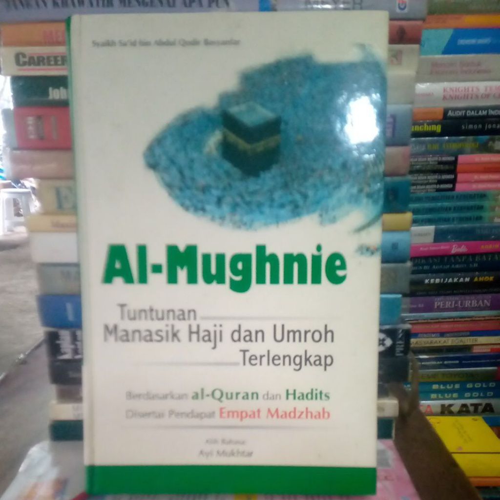AL-MUGHNIE TUNTUNAN MANASIK HAJI DAN UMROH TERLENGKAP