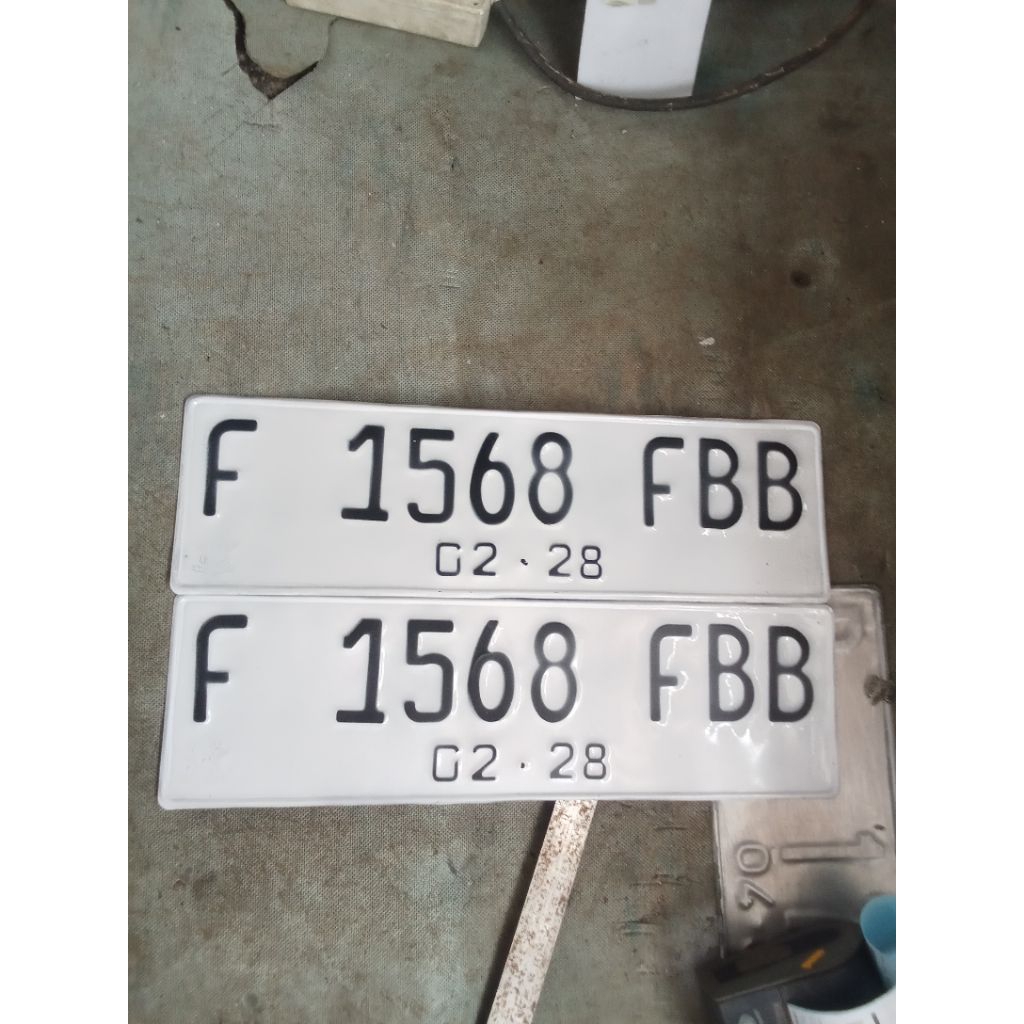 plat nomer kendaraan mobil standar Samsat logo Korlantas polri kanan kiri