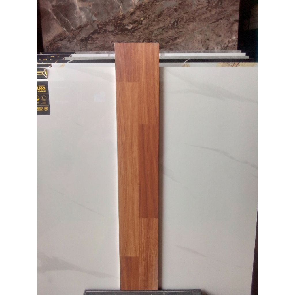 Granit List Plin Motif Kayu 10x60 Indogres Parquit Brown