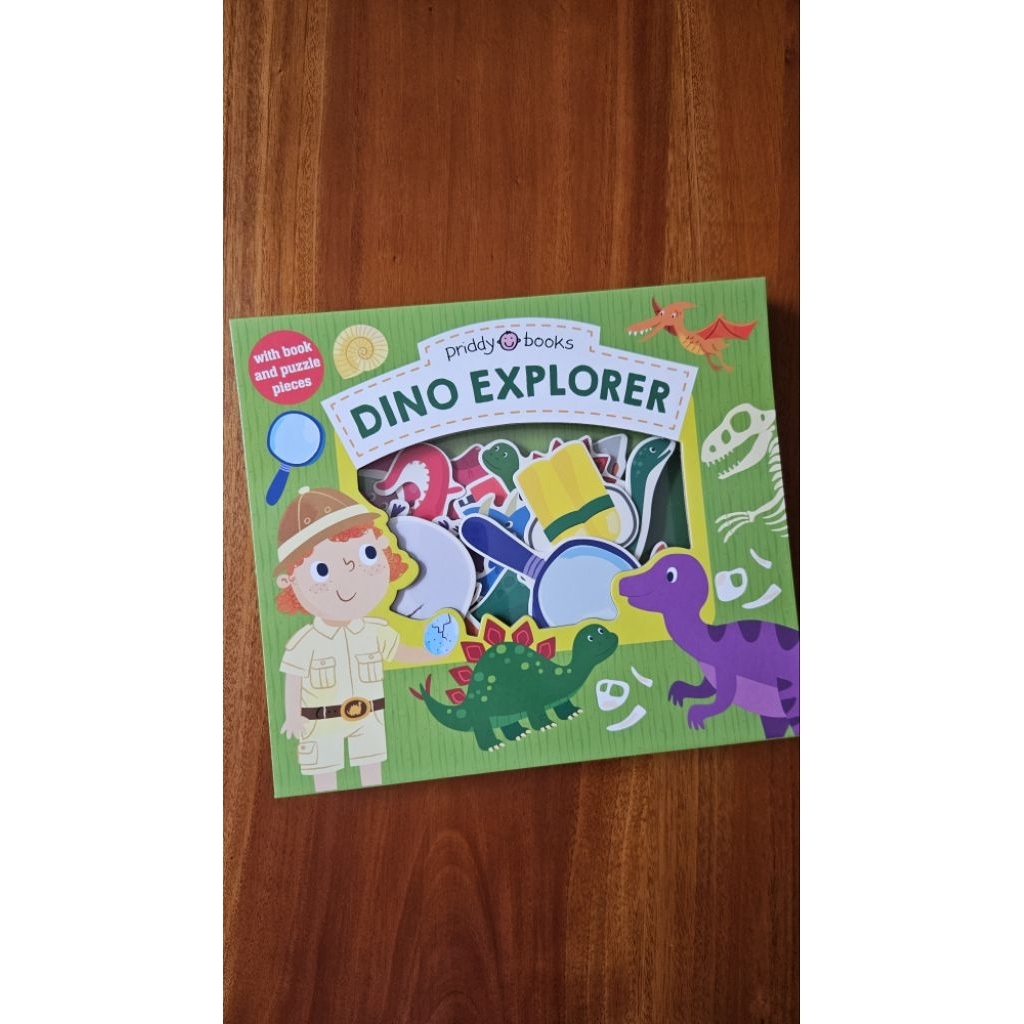 Dino Explorer. Book and Puzzle Pieces