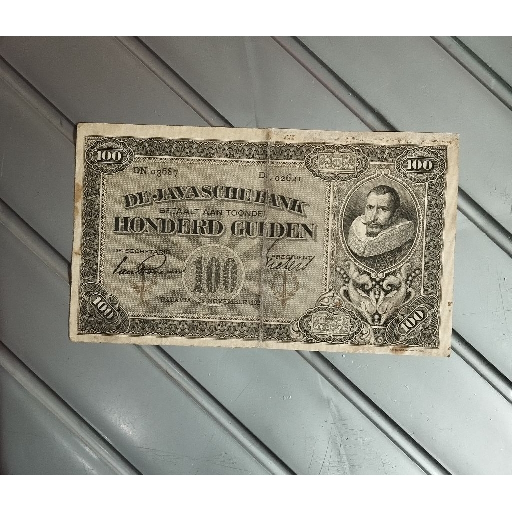 100 gulden coen  sinering kertas masih bagus original asli