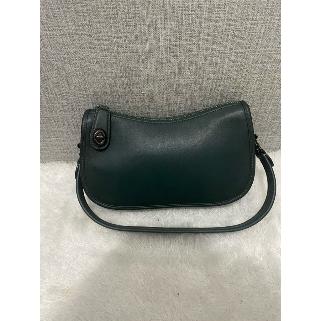 coach swinger butik ori