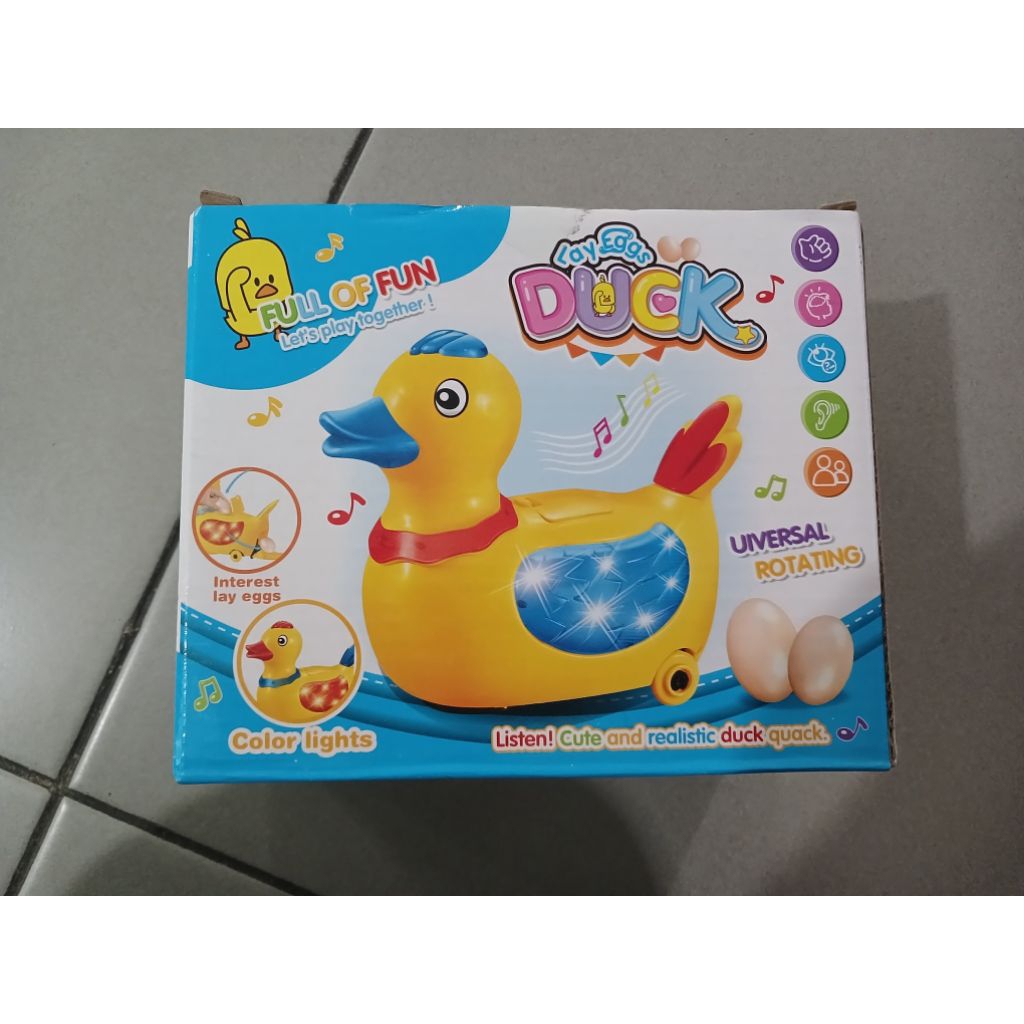 Mainan Bebek Musik Berjalan Bertelur