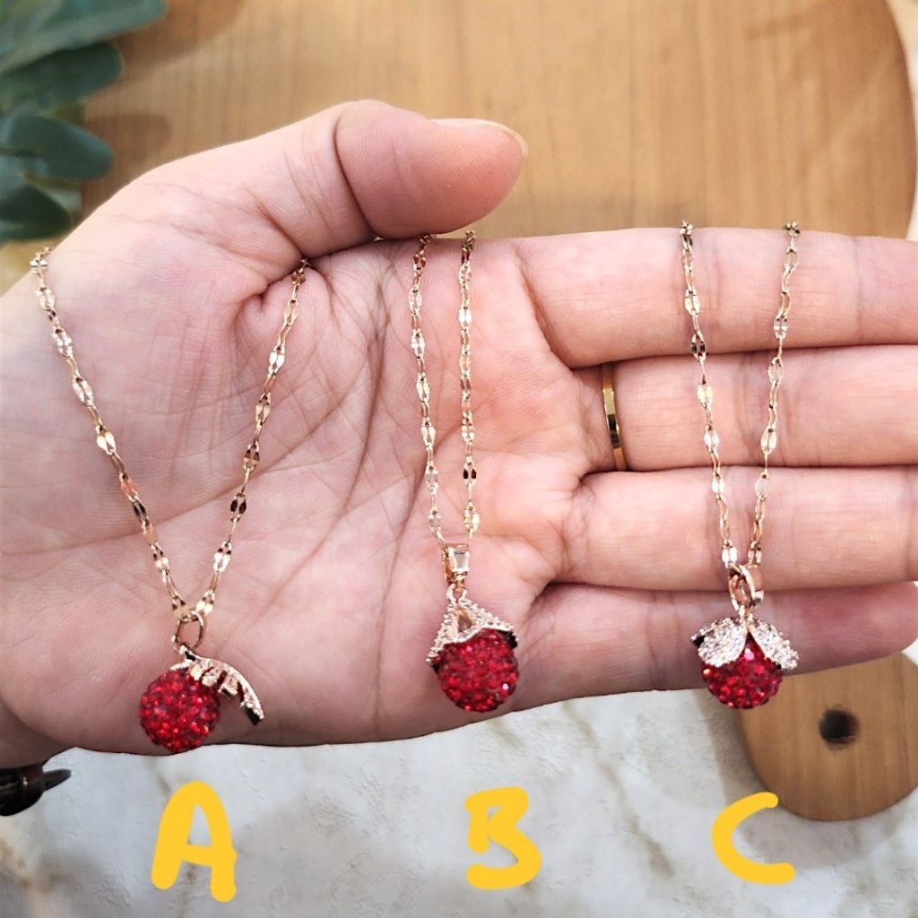 Kalung titanium bandul merah