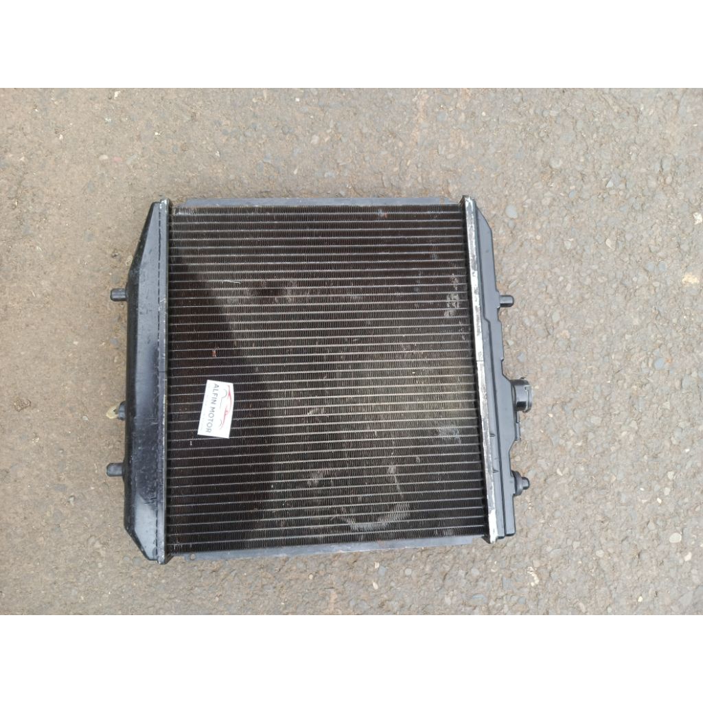 Radiator Daihatsu Charade Classy Original Copotan Garansi