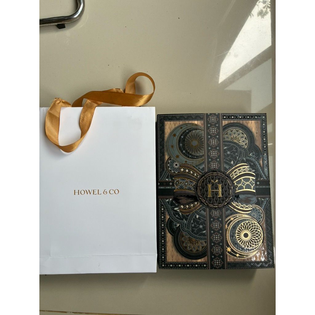 handuk sport howel and co