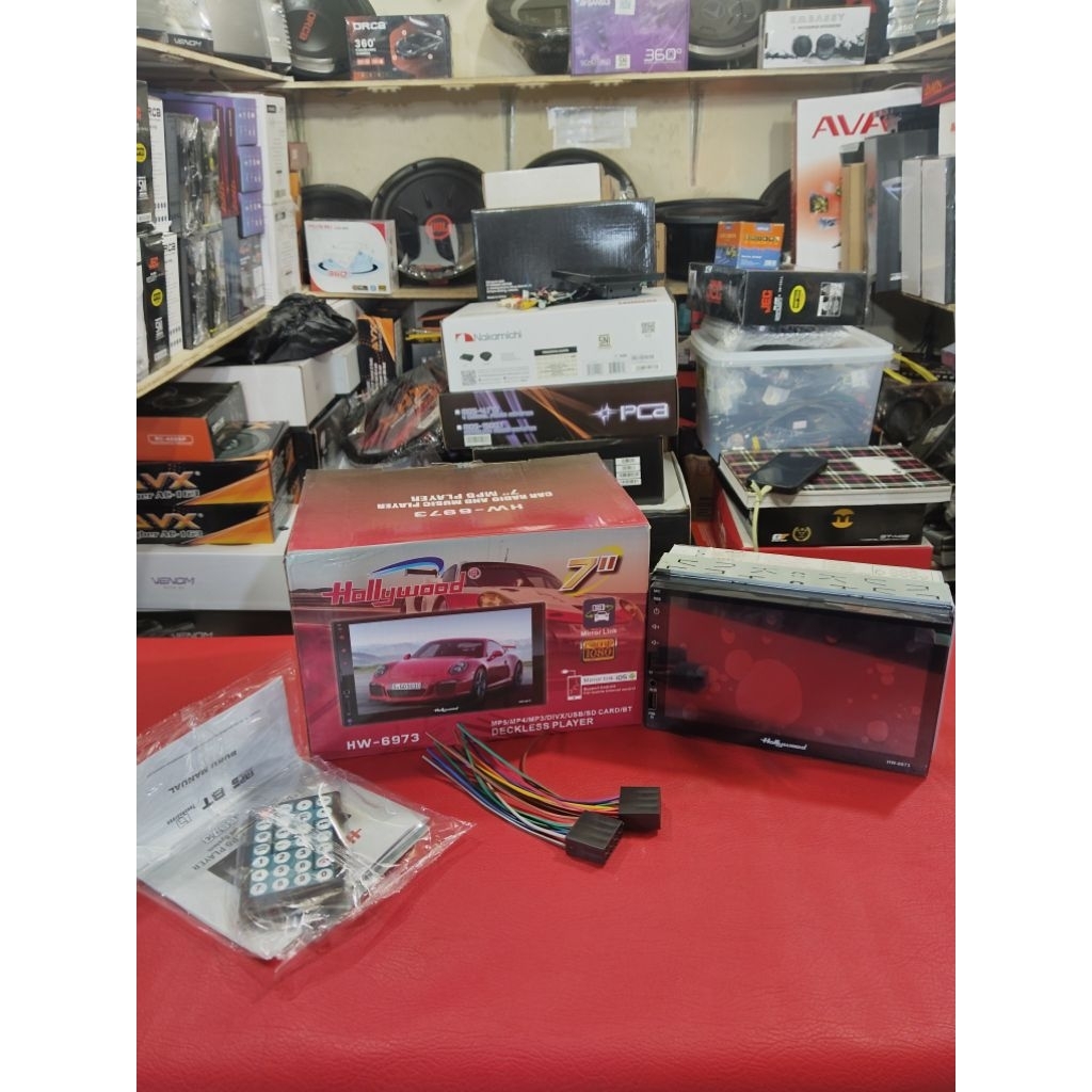 Headunit Doubledin HOLLYWOOD seri HW-6973 Pullglas Millorink Supot MP4 Audio Mobil