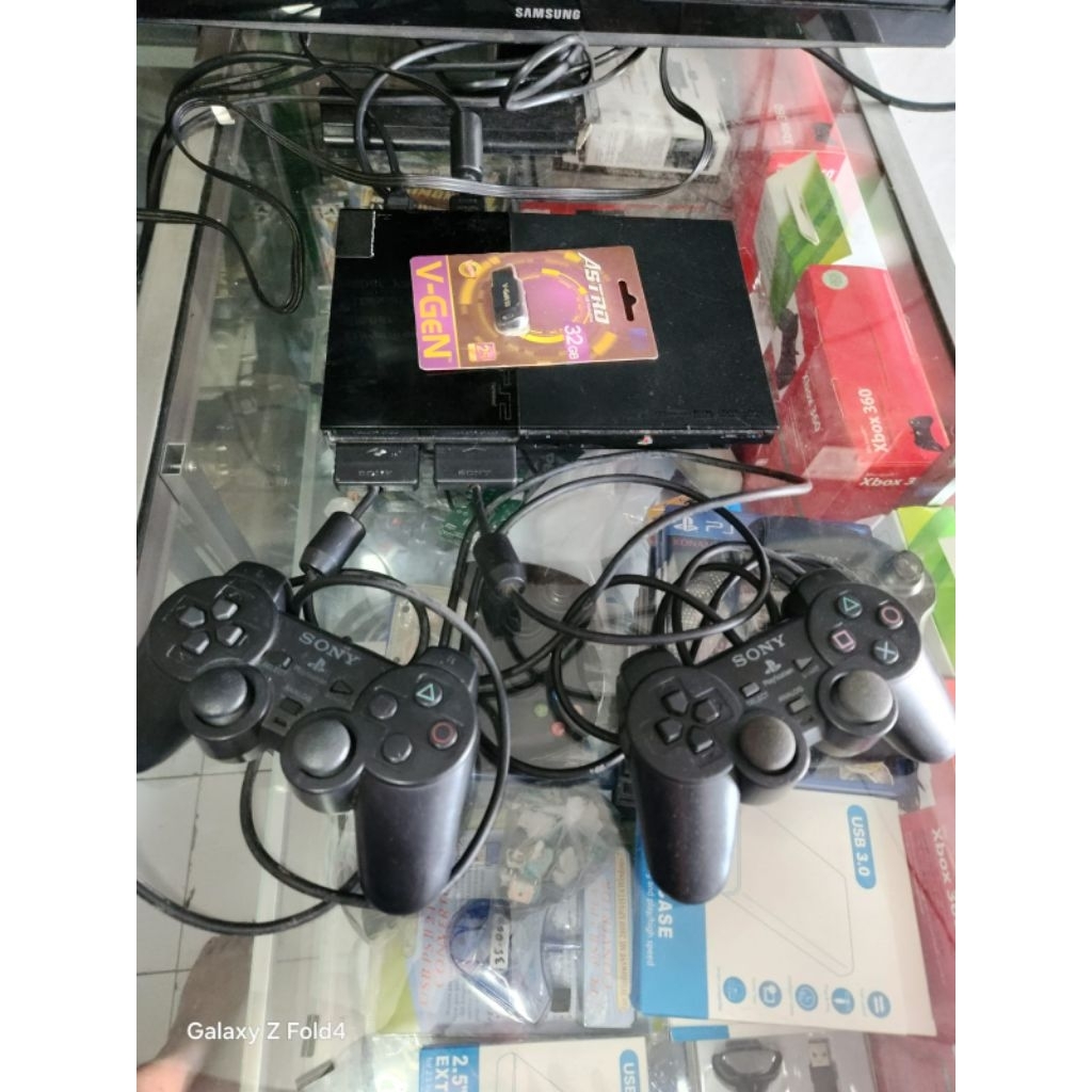 bismillah jual ps 2 slim matrix seri 9 flashdisk 32 gb stik 2 kbel² lengkap