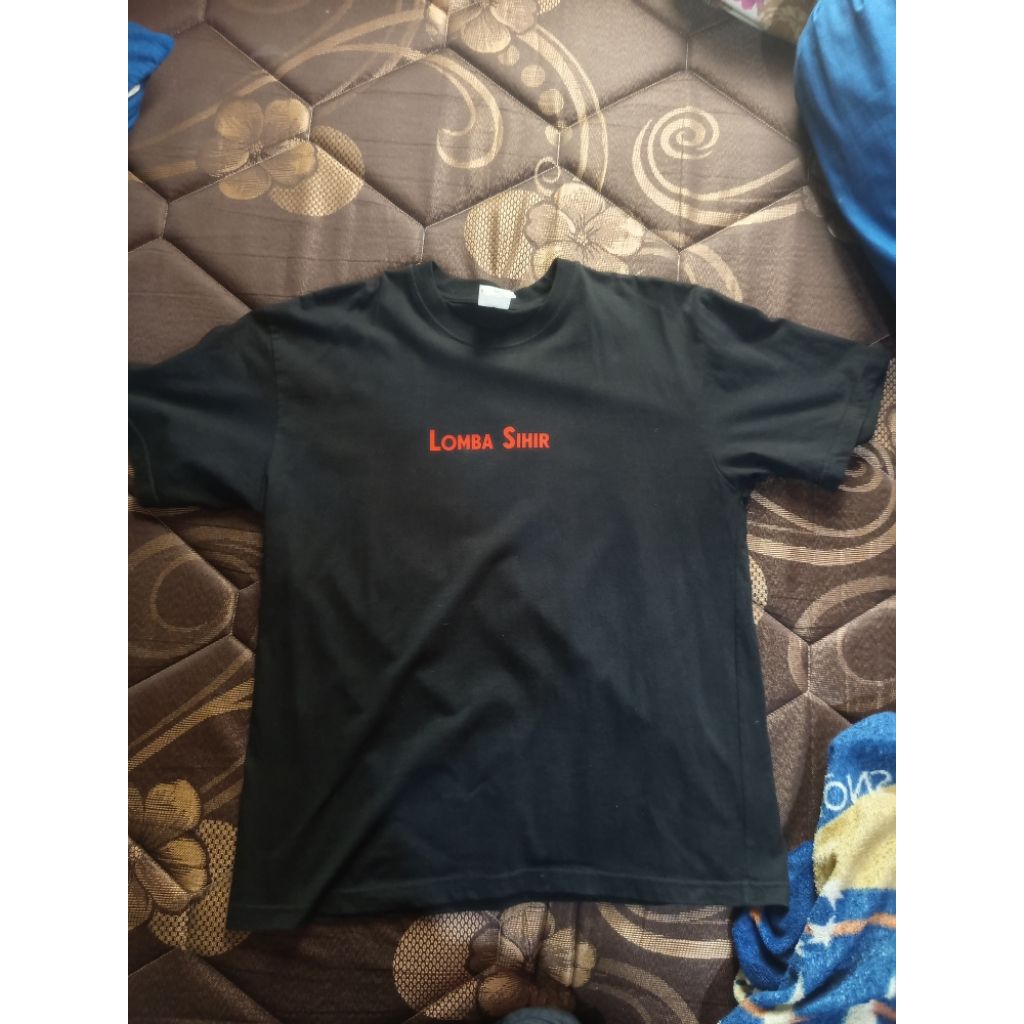 t-shirt lomba sihir