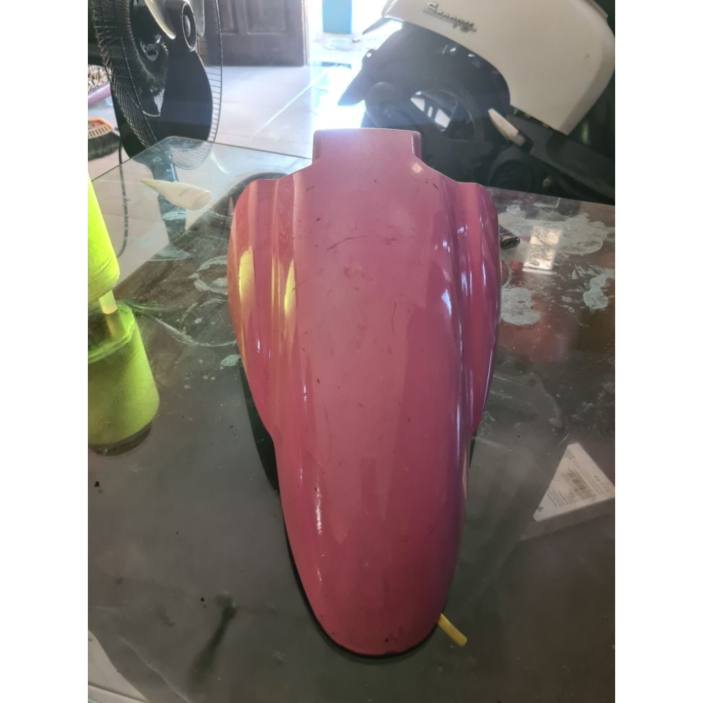 spakbor depan spin 125