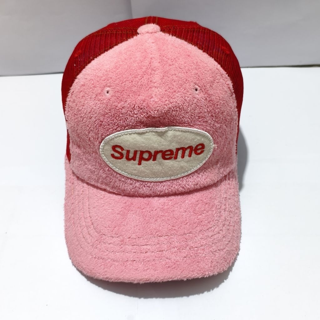 Topi supreme
