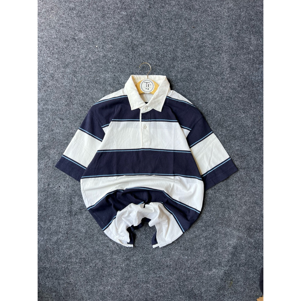 Polo shirt garis” uniqlo