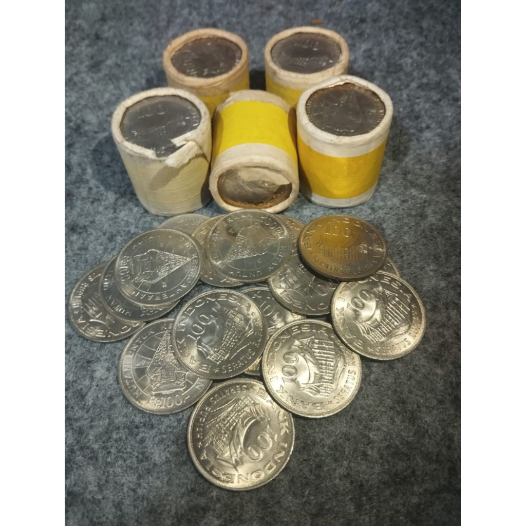 uang koin kuno 100 rupiah wayang luster/ baru