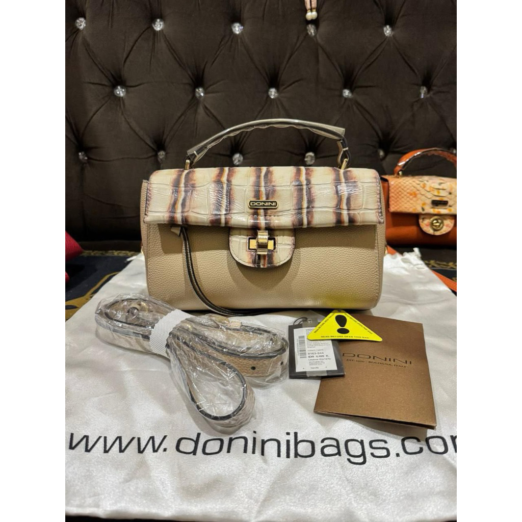 tas donini vigo cream