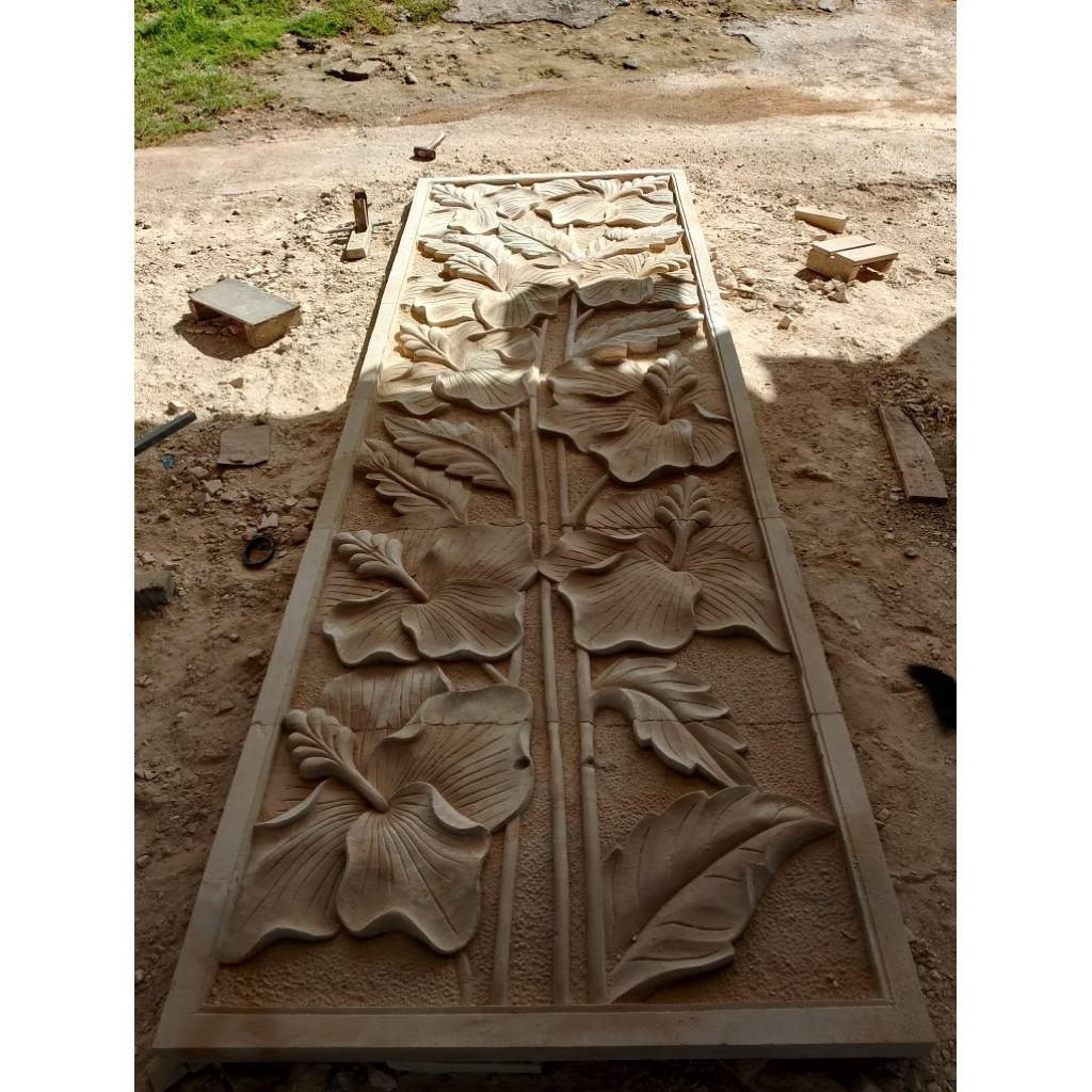 relief batu ukir dinding