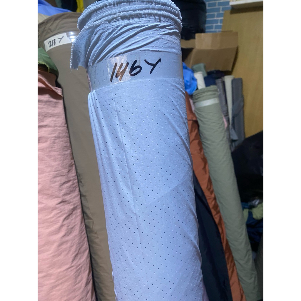 kain parasut despo bolong2 lembut buat tas jaket