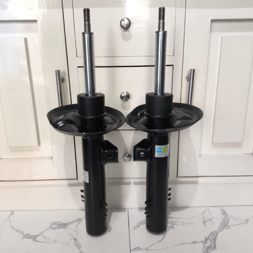 shock bmw x3 e83 depan