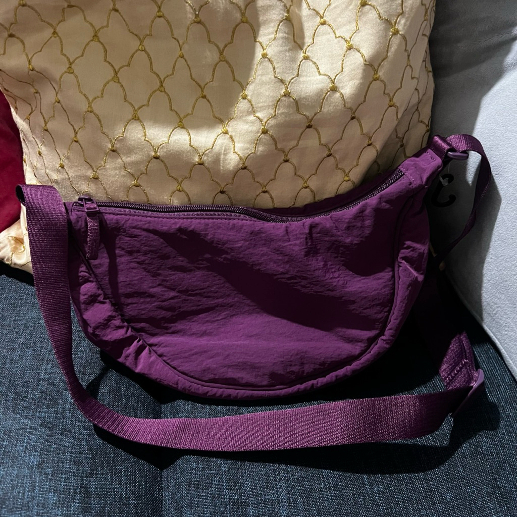 Uniqlo round mini shoulder bag
