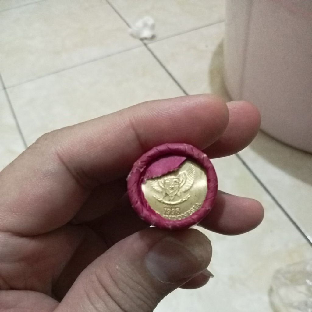 koin 1roll 100 karapan sapi
