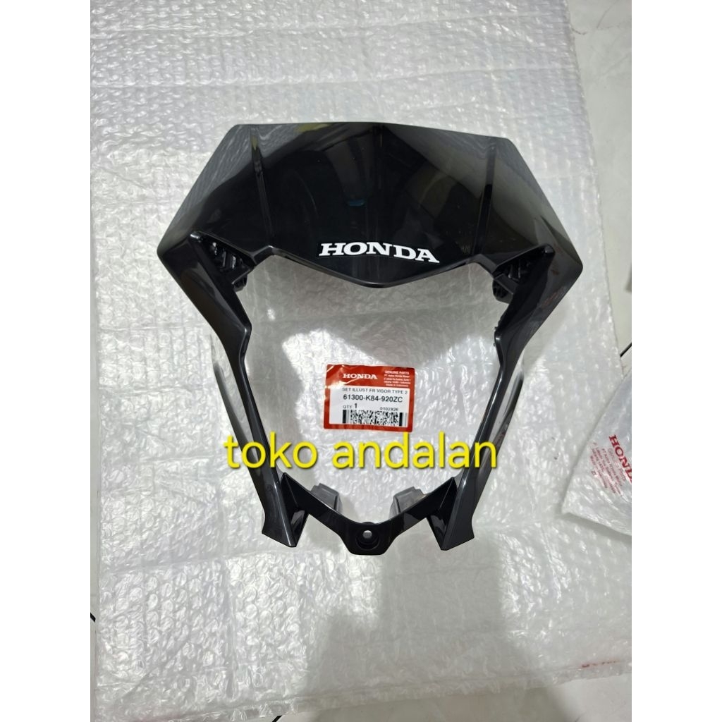 BATOK DEPAN ATAU VISOR DEPAN HITAM HONDA CRF ORI AHM 61300-K84-920ZC.  Cover Lampu Depan Hitam Honda