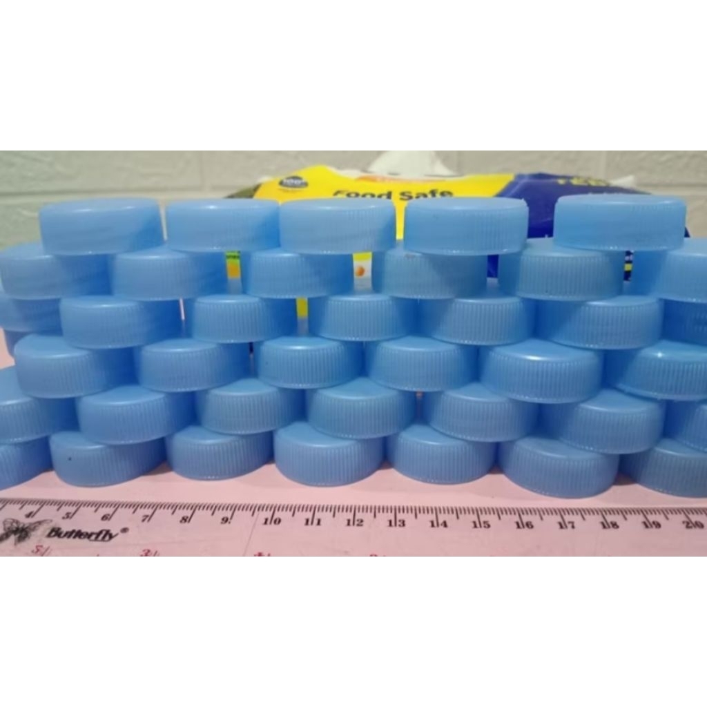 Tutup botol le mineral bekas isi 100pcs