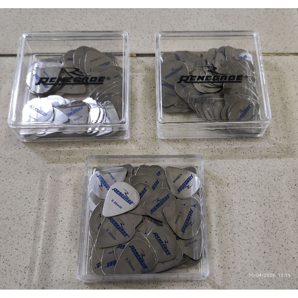 PICK / PIK GITAR 0.30MM TIPIS RENEGADE STAINLESS STEEL 0.30MM GUITAR