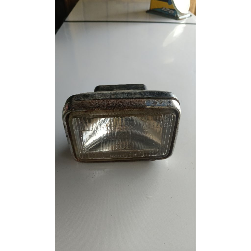 lampu depan suzuki ts125/a100 ori
