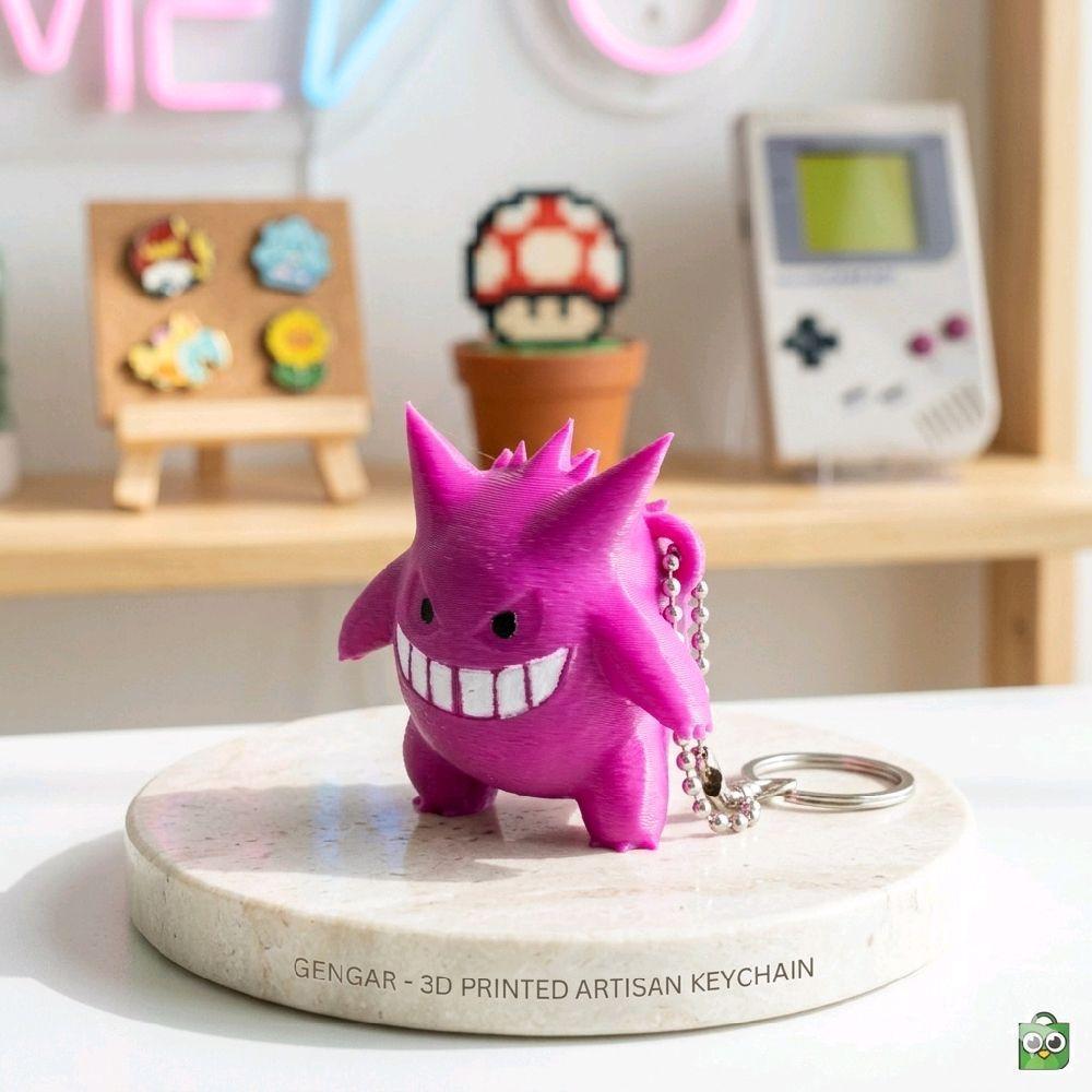 Gengar Keychain - Aksesori Kunci Unik dengan Desain Gengar Berwarna Ungu dan Senyum Menarik
