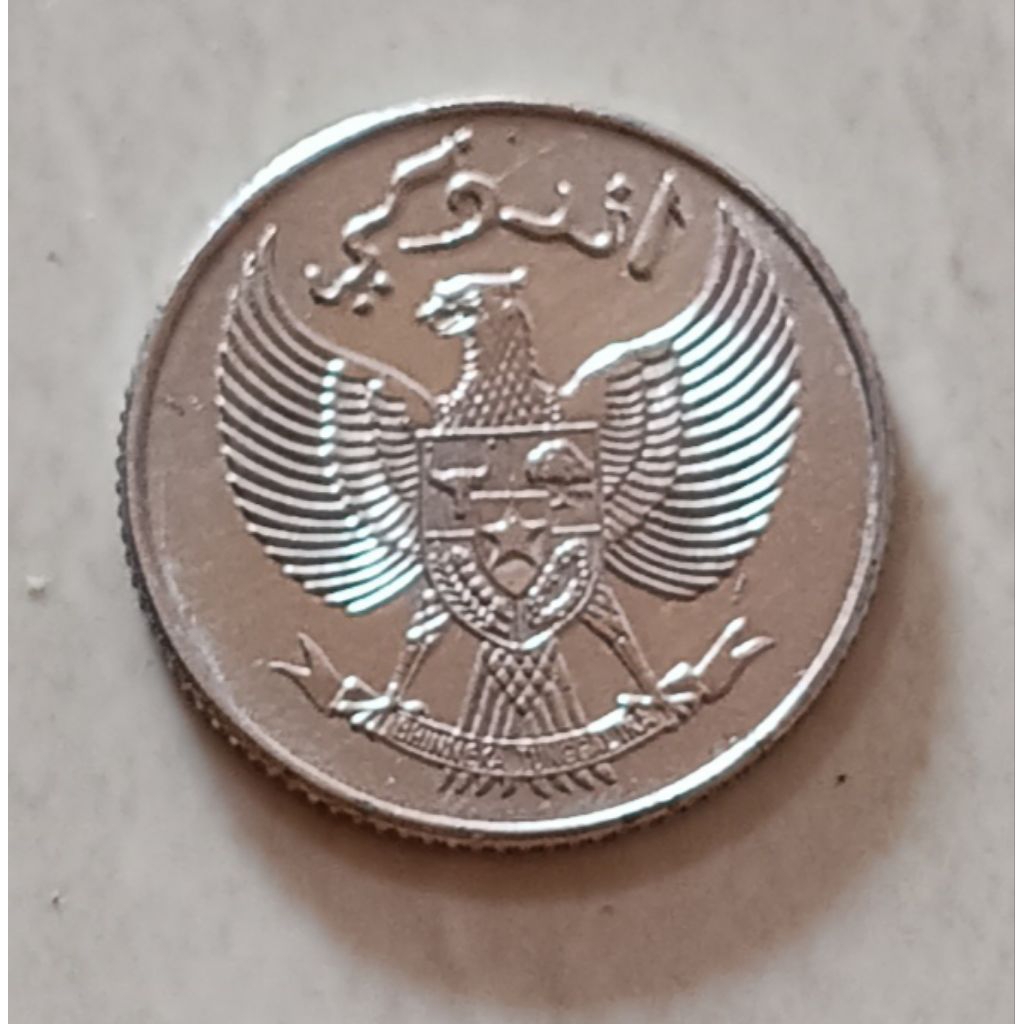 koin Indonesia 10 sen tahun 1954..