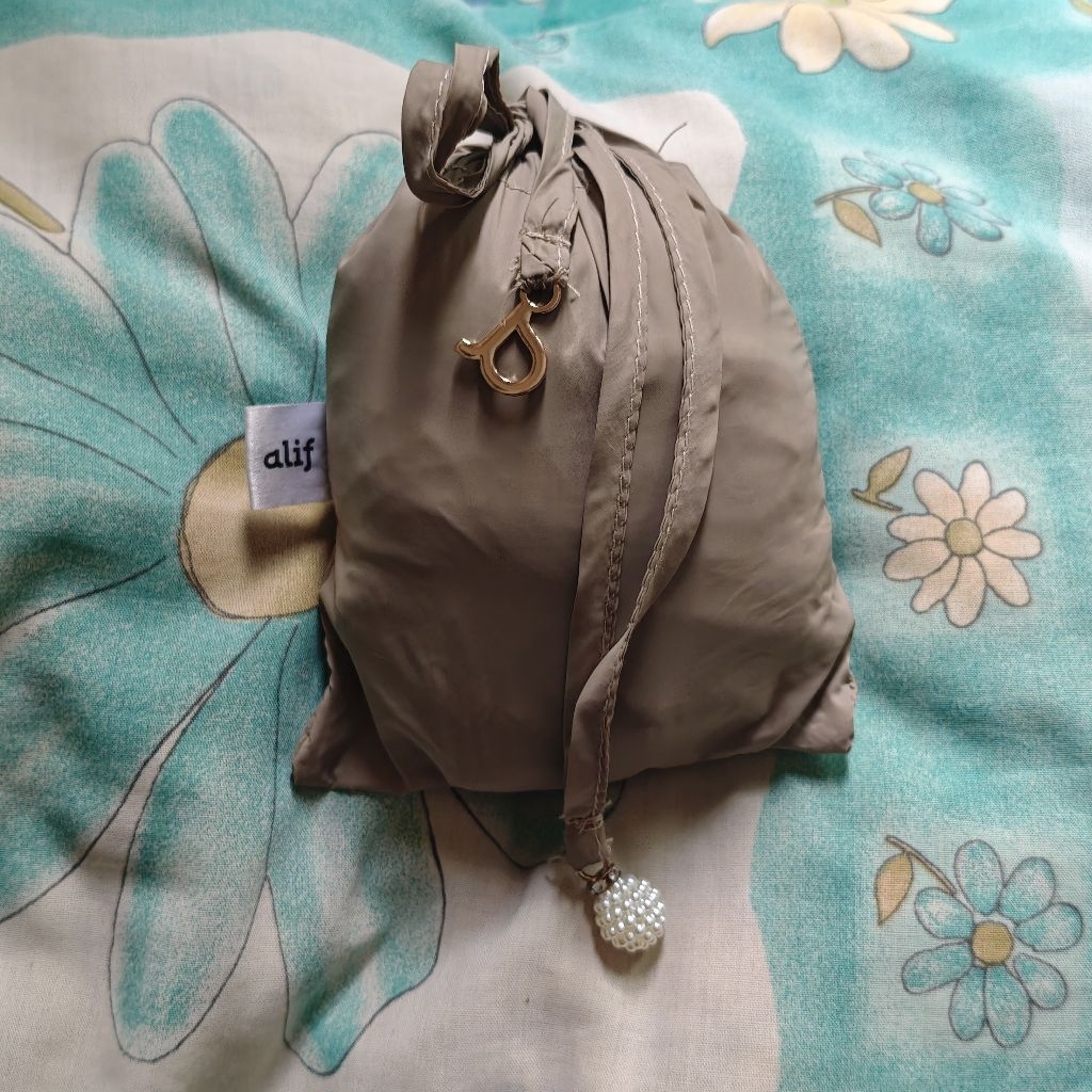 preloved mukena travel alif warna oyster gray