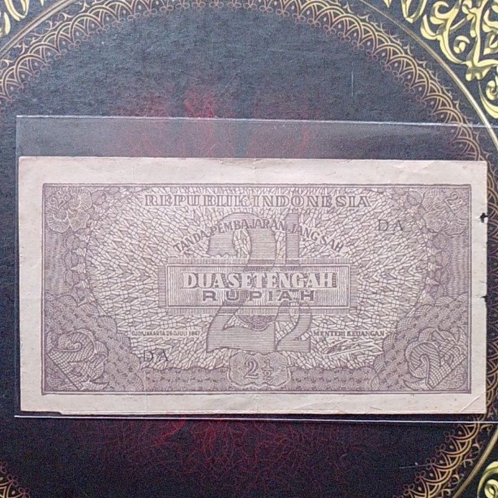 Uang ORI 2,5 Rupiah 1947 vf gripis margin