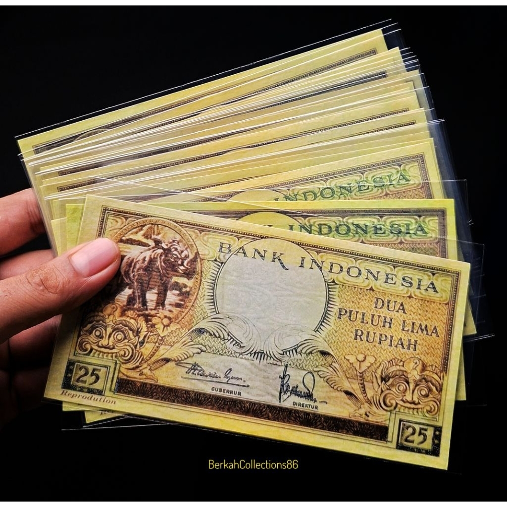 souvenir uang 25 rupiah seri hewan badak /uang mainan /bukan asli
