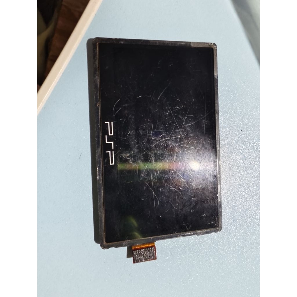 Layar PSP go bekas Normal (banyak lecet sesuai foto)