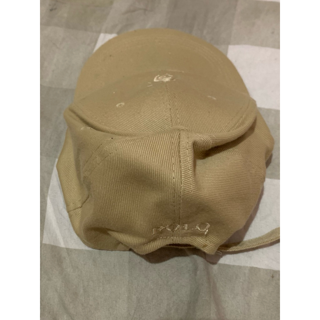 preloved topi polo cream