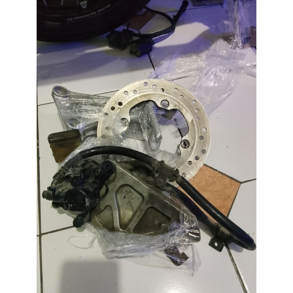 rem belakang tiger revo