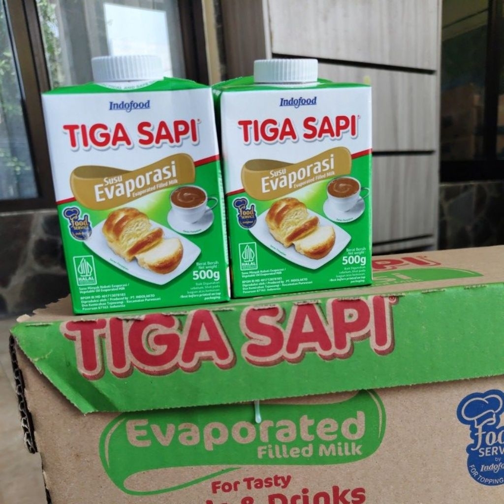susu evaporasi tiga sapi 1dus karton