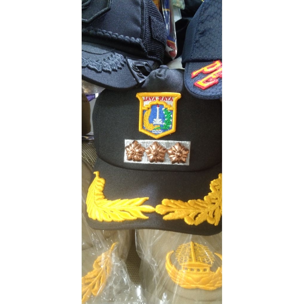 topi Pemda DKI Jakarta,topi Pemda DKI (bunga)