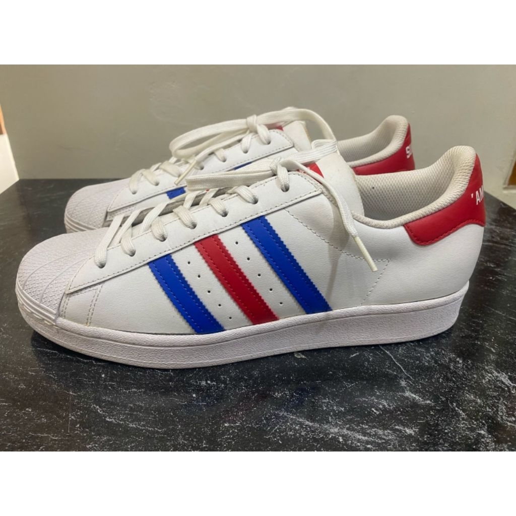 Sepatu Adidas Superstar Americana, kulit warna putih bersih, list logo merah biru size 44 insole 27-