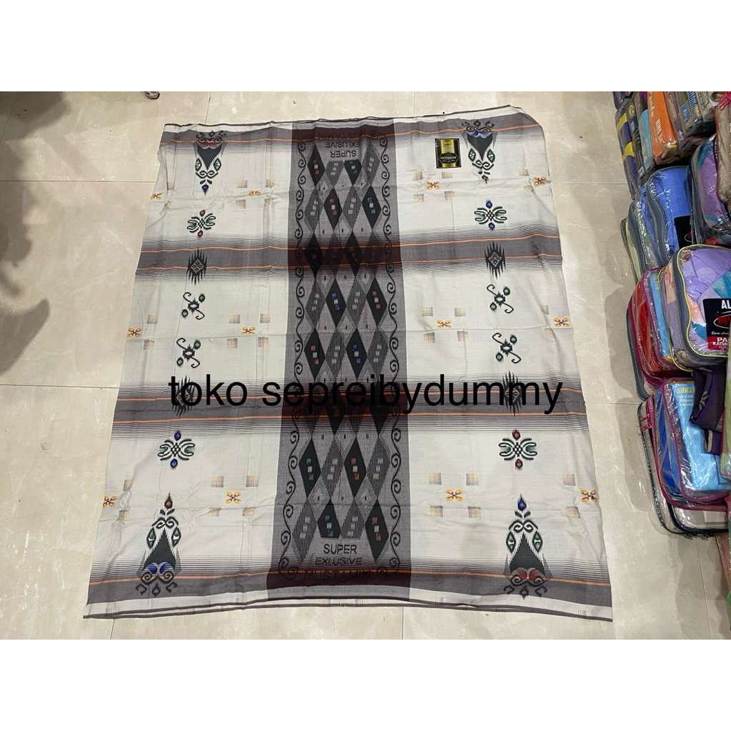 Sarung Mustamin songket warna cokelat kombinasi