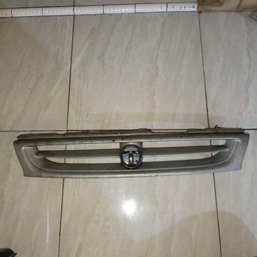 GRILL BUMPER DEPAN TIMOR SECOND ORIGINAL
