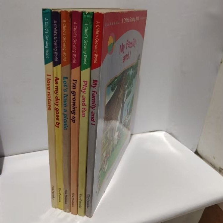A CHILD'S GROWING WORLD - Tira Pustaka