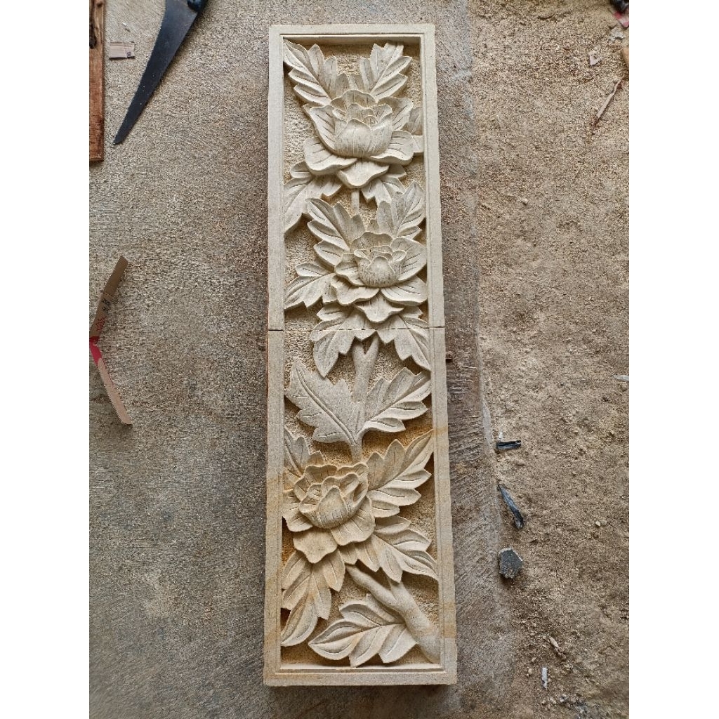 relief batu paras design bunga mawar