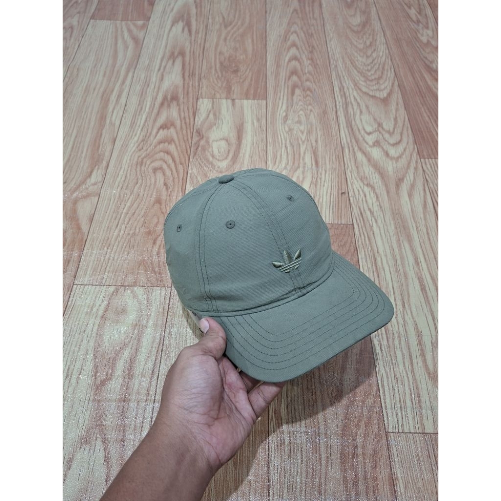 topi adi bunga small logo