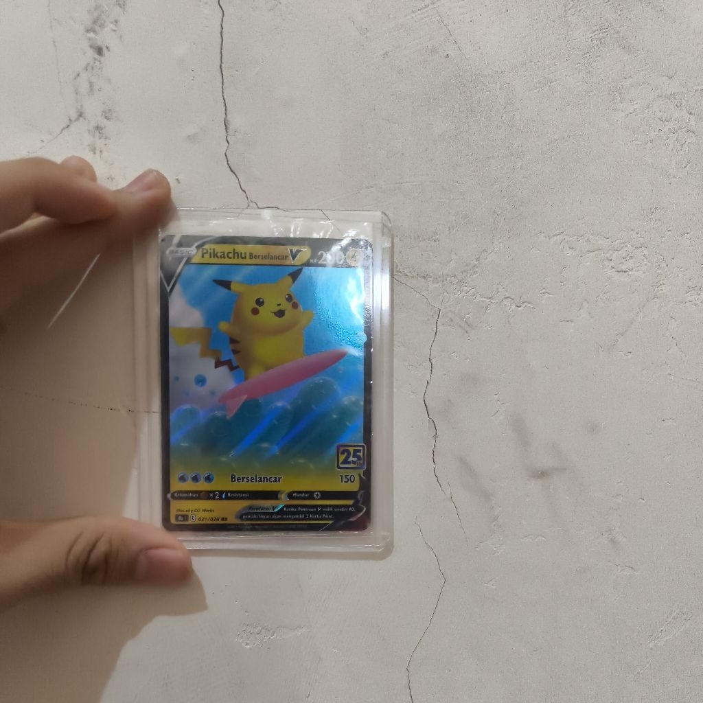 Pikachu berselancar 25TH ver Indo.